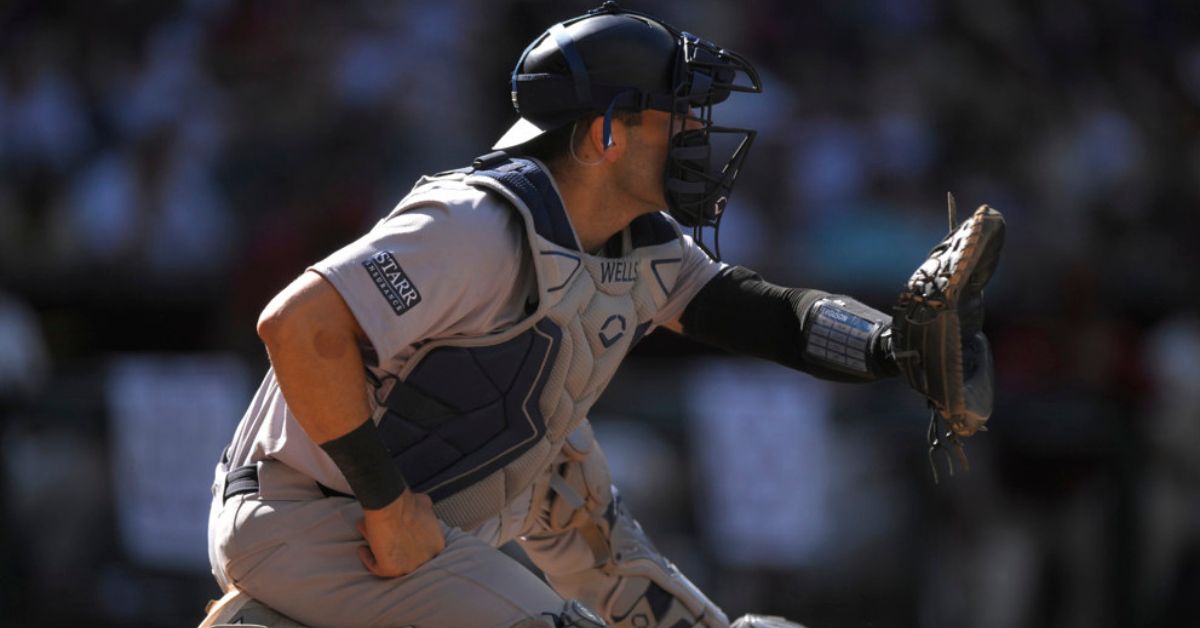 Yankees catcher Austin Wells prepares to catch a pitch.