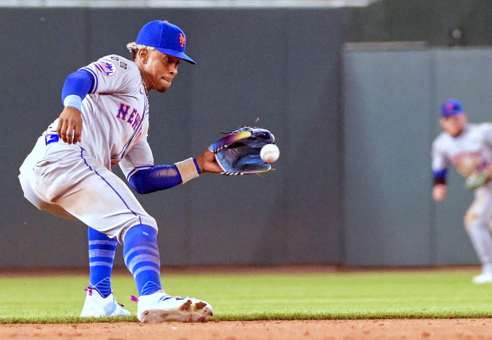 Francisco Lindor fields a ground ball at waist level