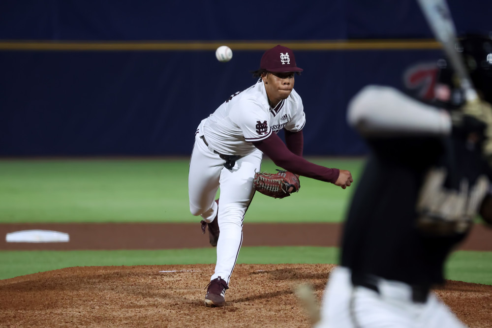 Jurrangelo Cijntje delivers a pitch to a Vanderbilt batter.