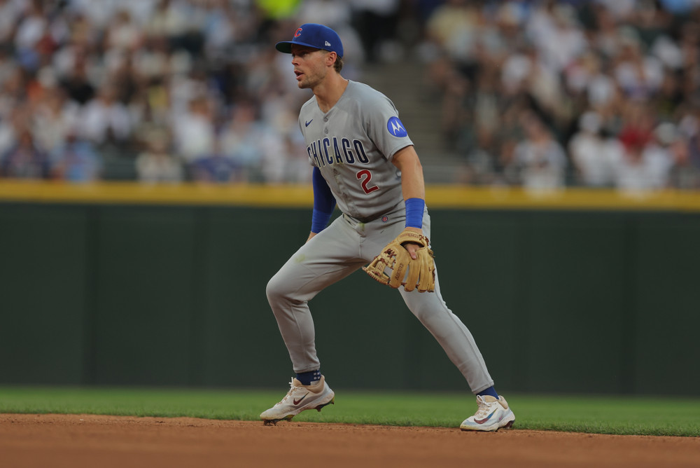 Nico Hoerner stands ready to make a defensive play from the second base position.